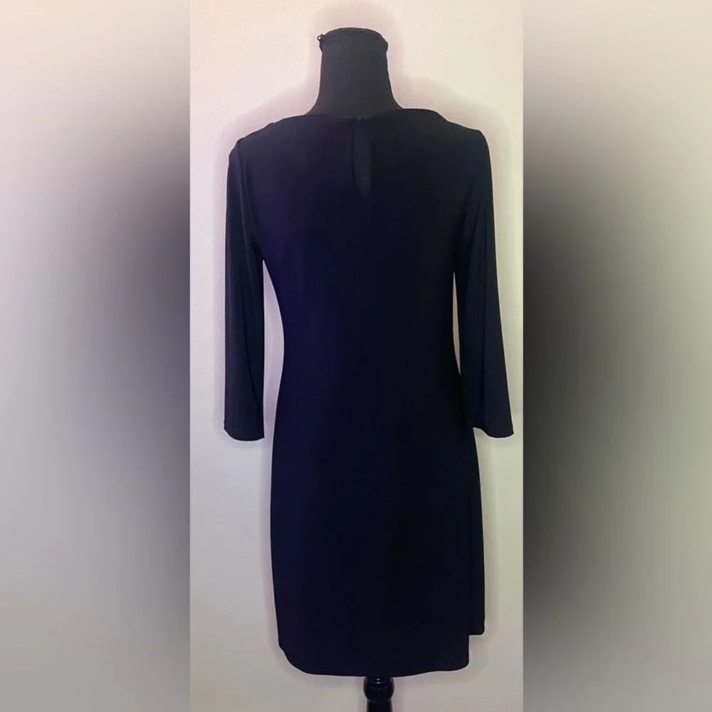 White House black market- Black mini dress with some‎ bedazzled detailing SizeXS